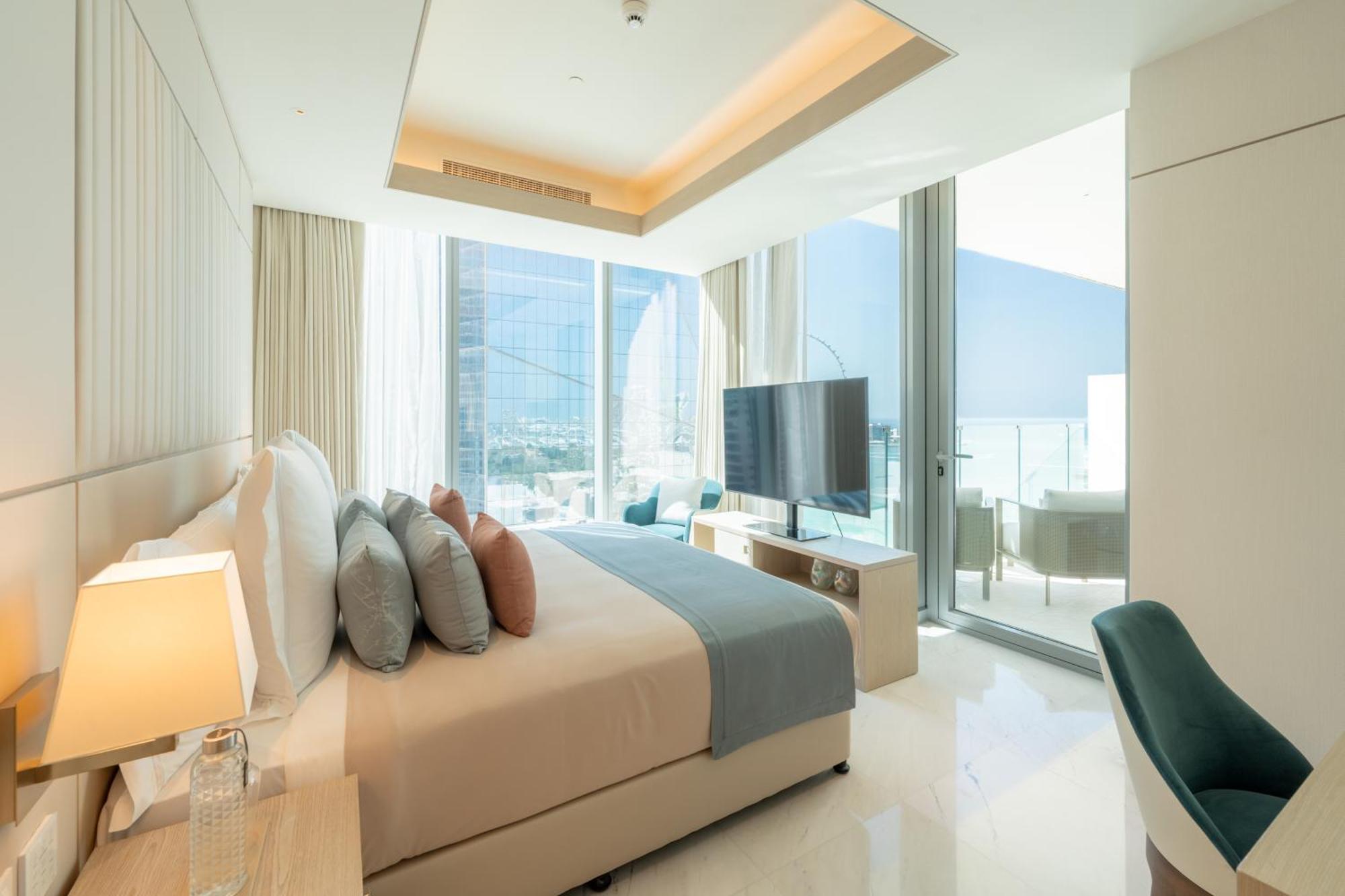 迪拜 Five Luxe酒店 外观 照片 A bedroom at the hotel